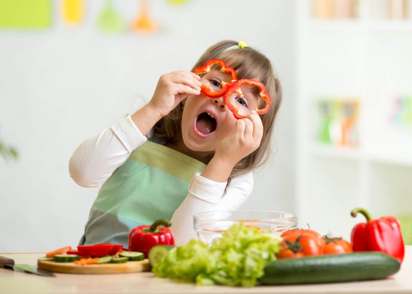 happy-girl-with-vegetables-kidhours