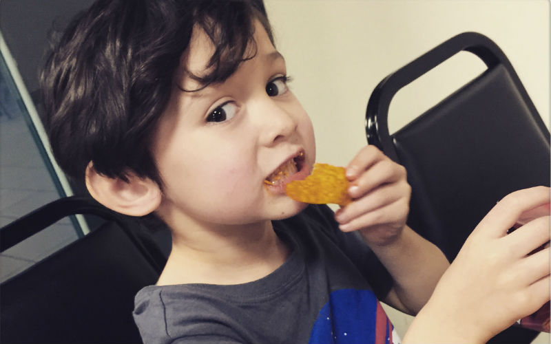 kid-eating-chips-kidhours