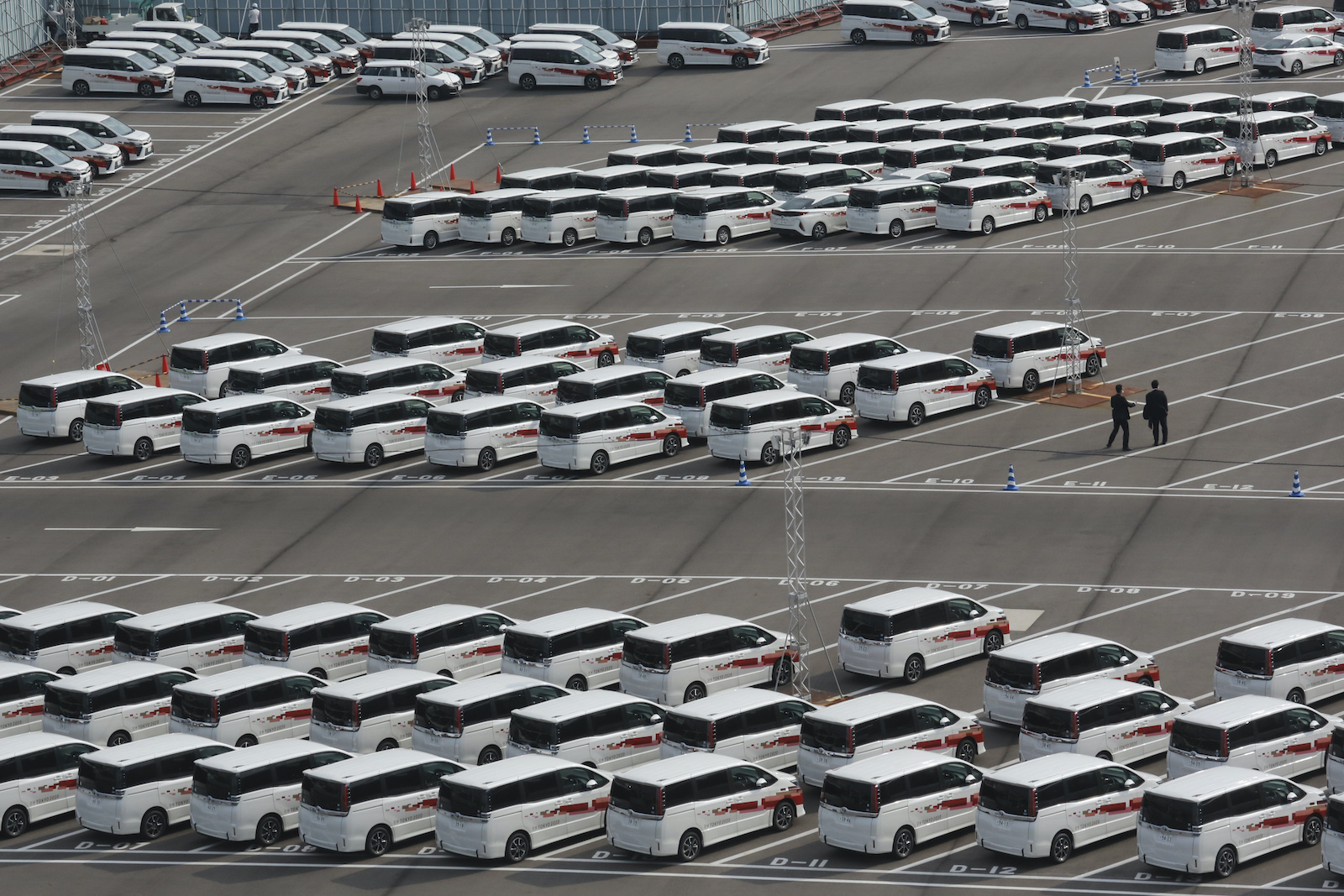 Vehicles for Tokyo 2020 Olympics park at Tsukiji Depot 